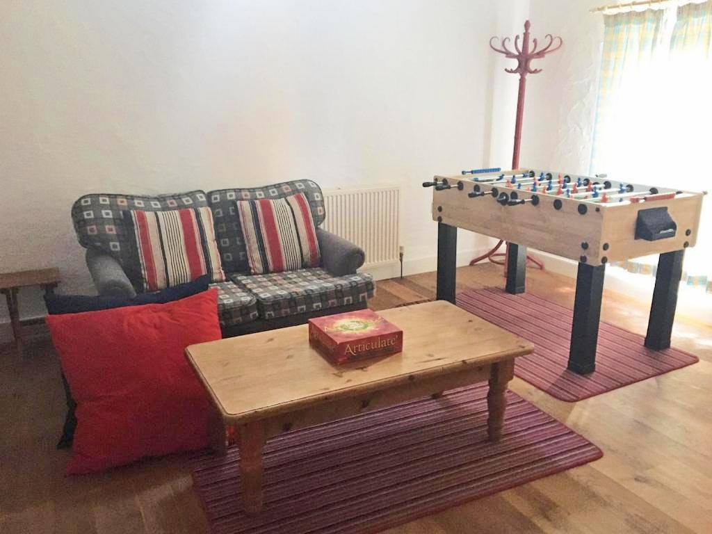 Separate area with tv and table football